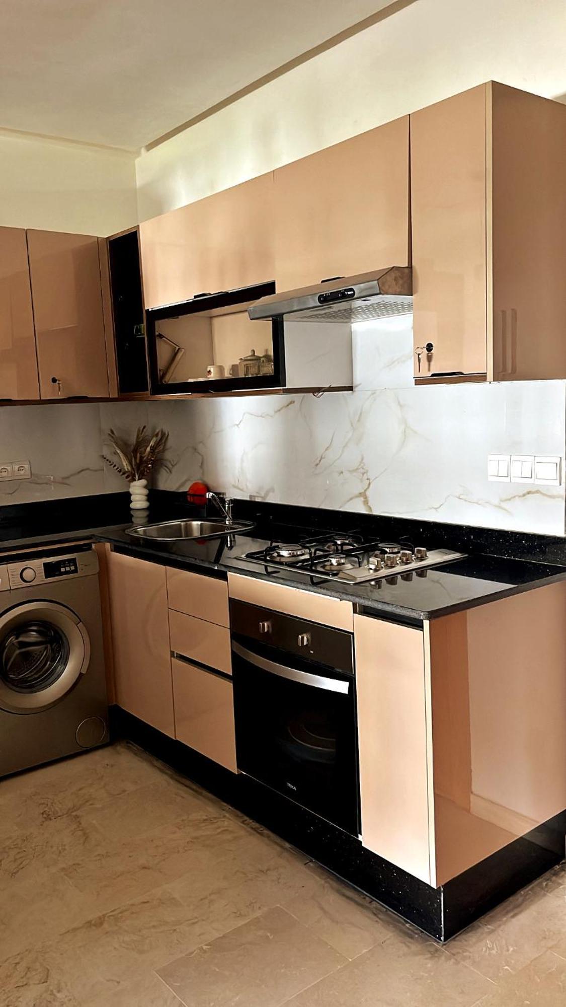 Elegant Appartement Avec Un Acces Piscine Jardin Parking Sous-Sol Et Wifi Haut Debit Fibre Optique Tânger Exterior foto